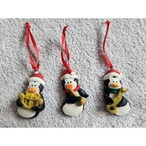 Vintage 1990's set of 3 Penguin Musical Christmas Ornaments Santa Hat Clay Style